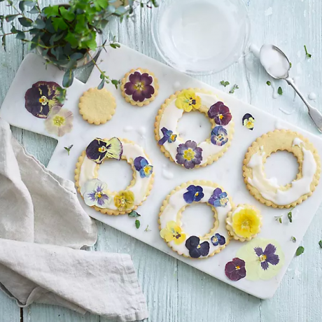 Ätliga pressade blommor